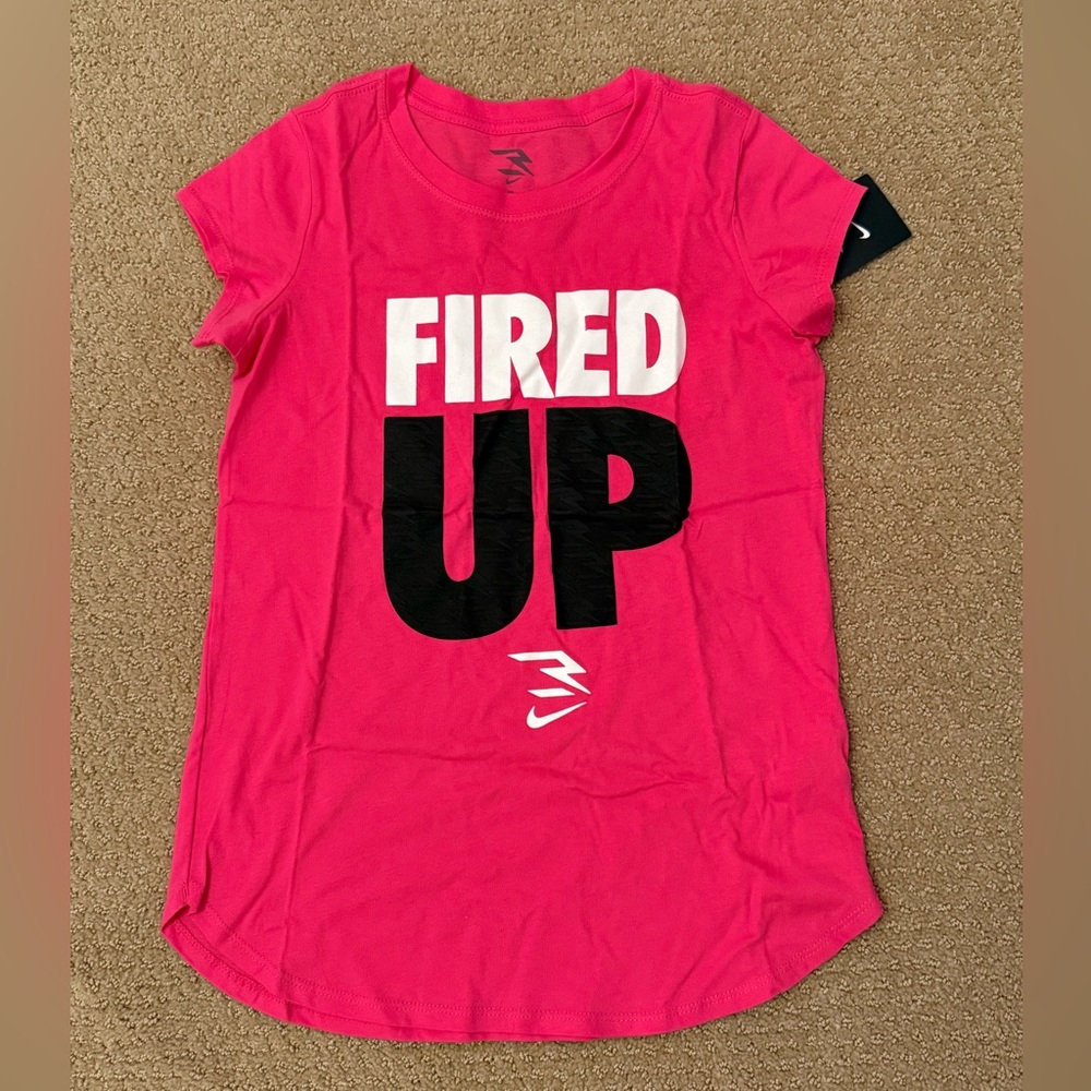 NWT. Nike girls ‘Fired Up’ top. Size youth XL.